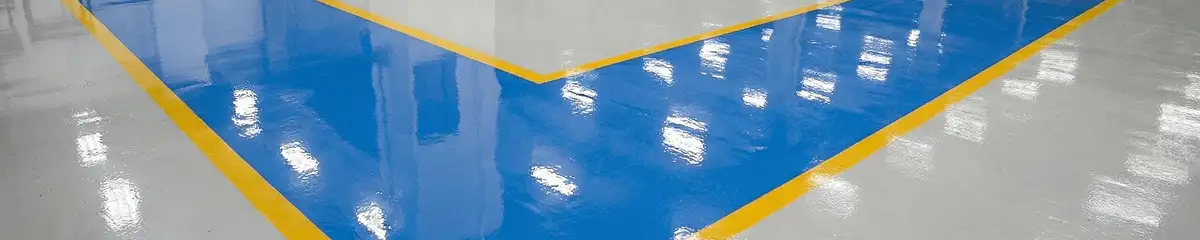 A factory floor professionally covered and marked with epoxy flooring in Norfolk, VA