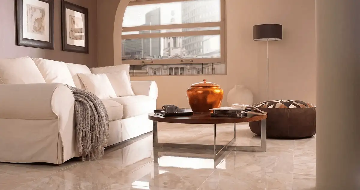 Modern living room with professionally installed marble flooring, a beige sofa, coffee table in Norfolk, VA