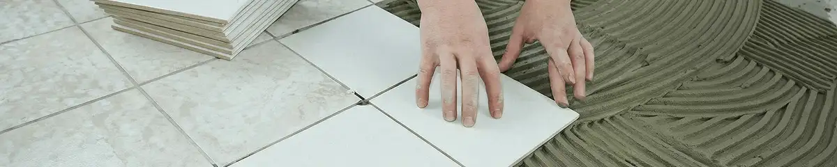 Professional installing white tile floors in Norfolk, VA