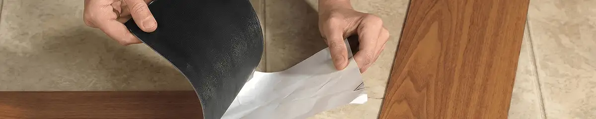 A professional installing vinyl flooring in Norfolk, VA